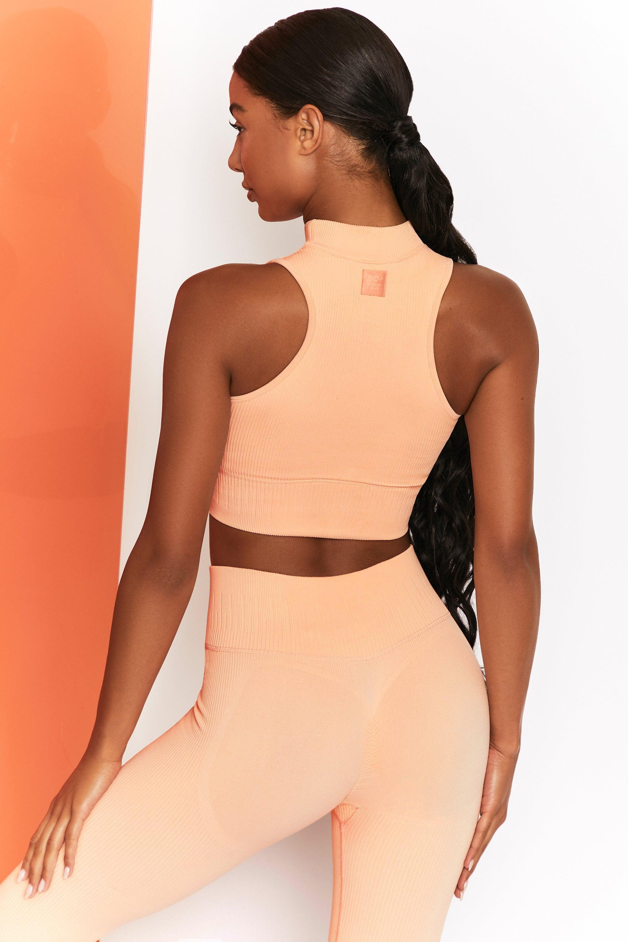 Miles Ahead Ribbed High Neck Crop Top in Peach Female Product Image