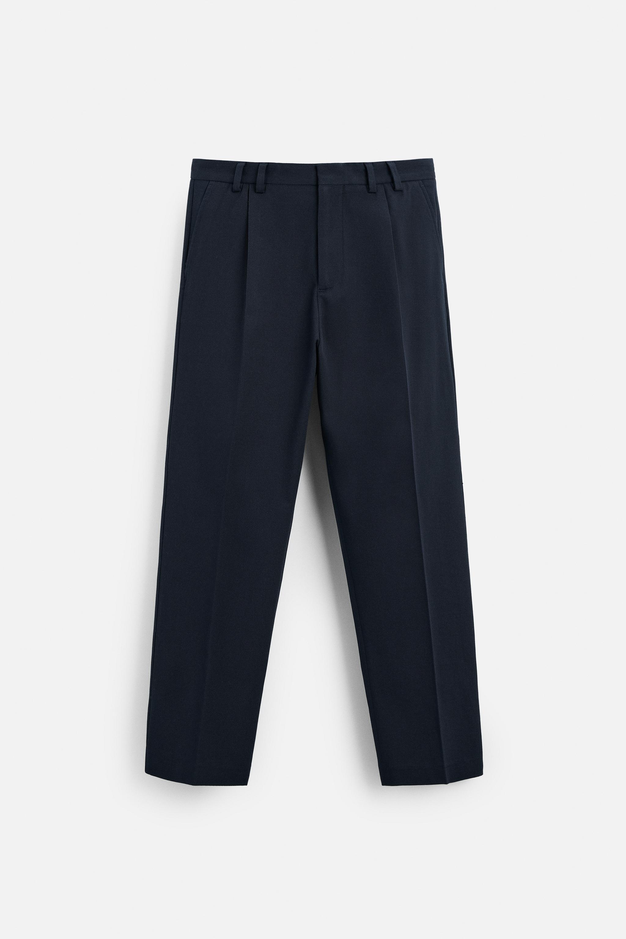 TEXTURED PLEATED PANTS Product Image