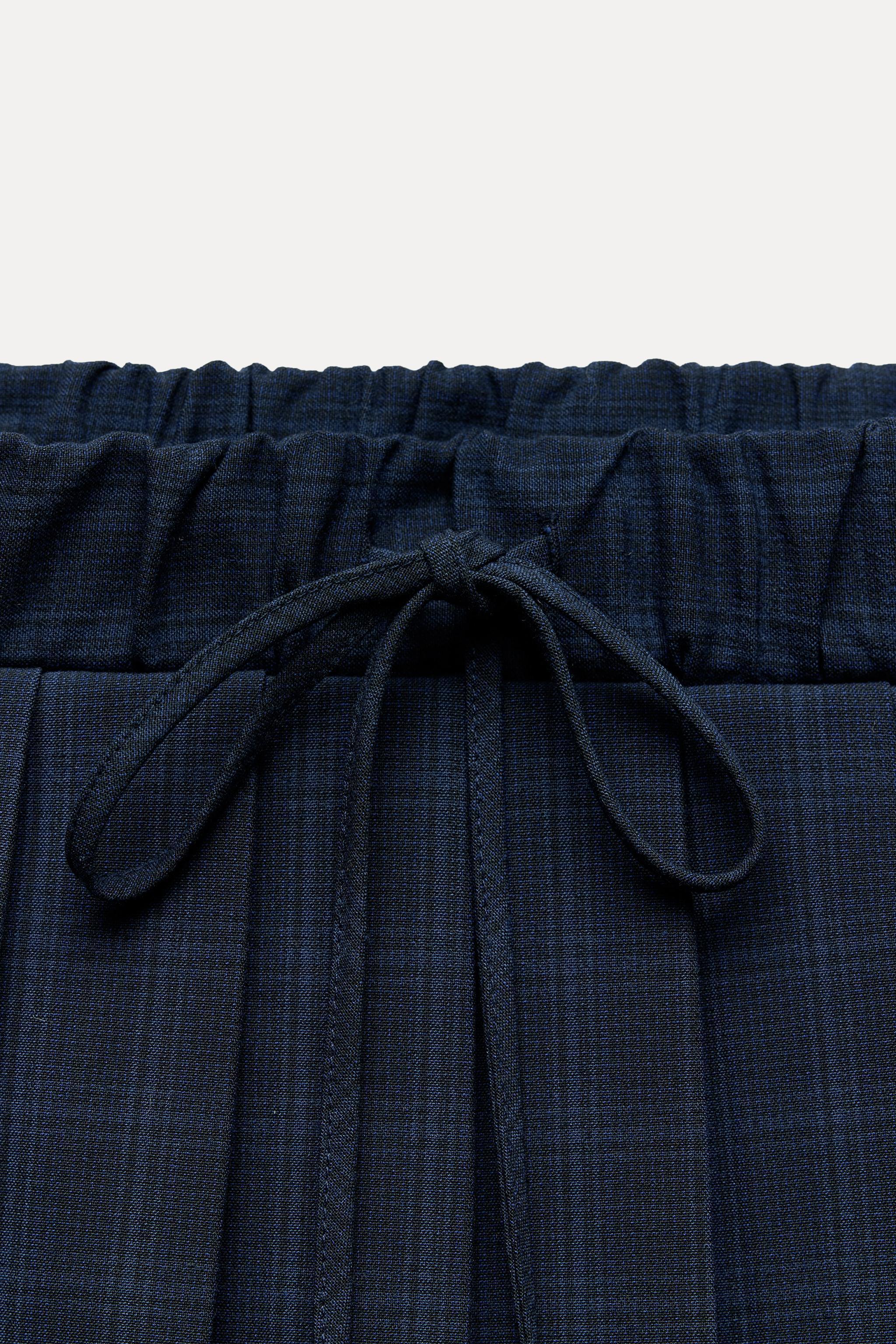 CHECKERED PLEATED MINI SKIRT Product Image