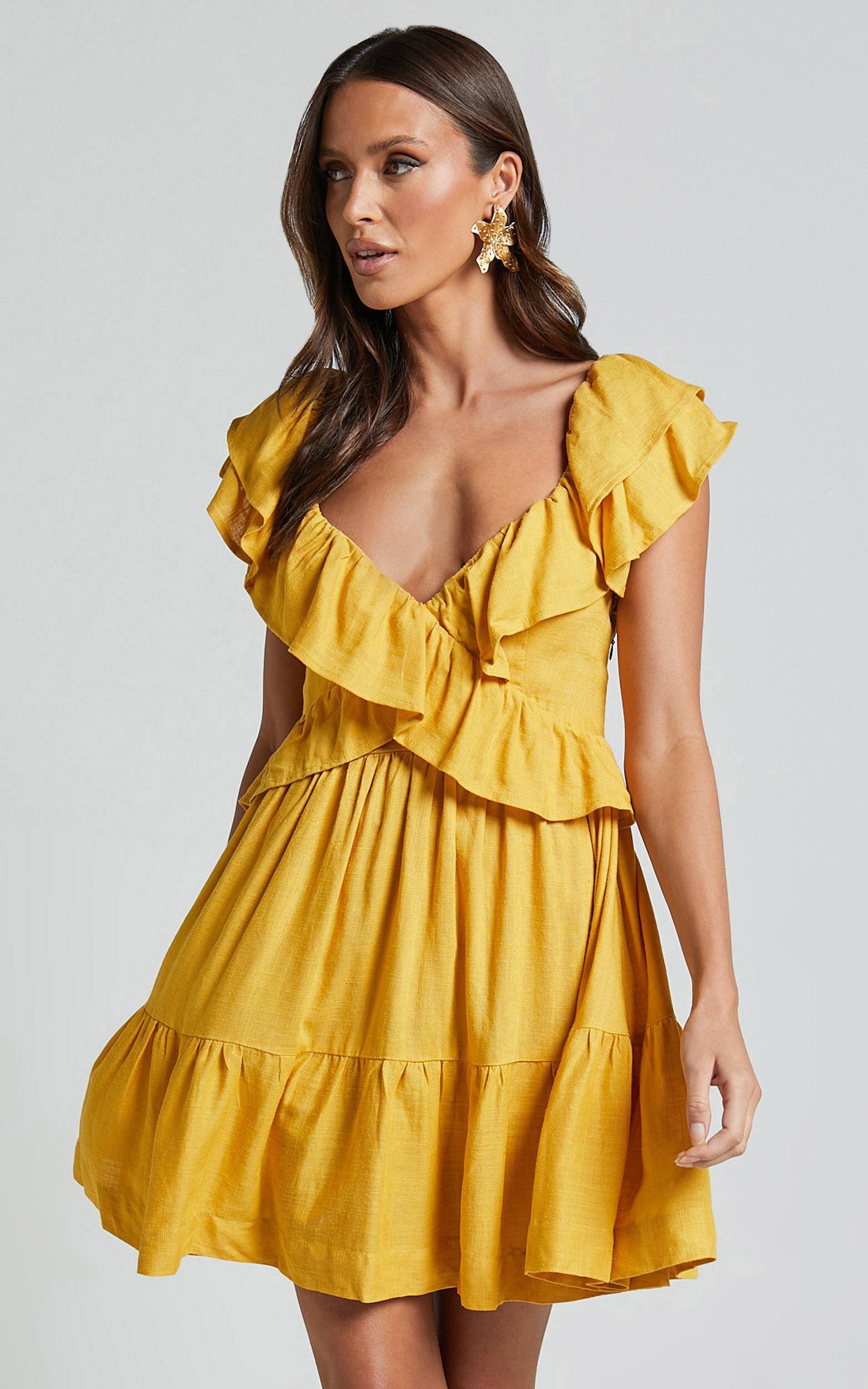 Amalie The Label - Hescia Linen Blend Frill Detail Low Back Mini Dress in Warm Yellow Gold Product Image