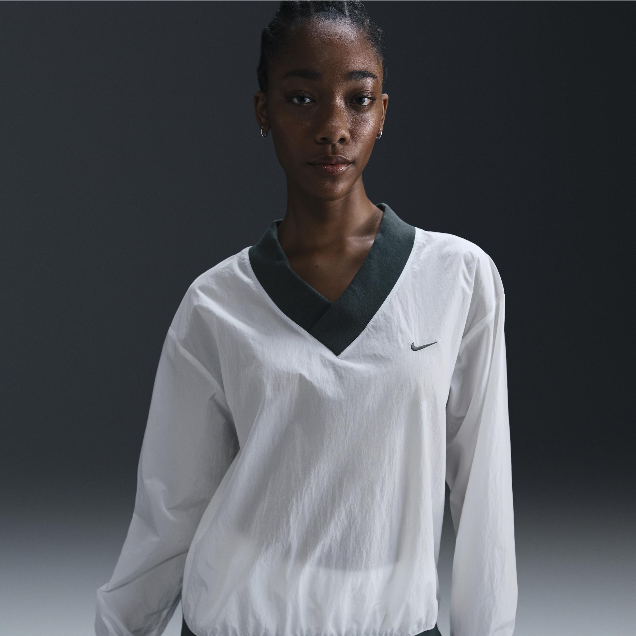 Nike Sportswear Essential Women's Loose UV Woven Long-Sleeve V-Neck Top Product Image