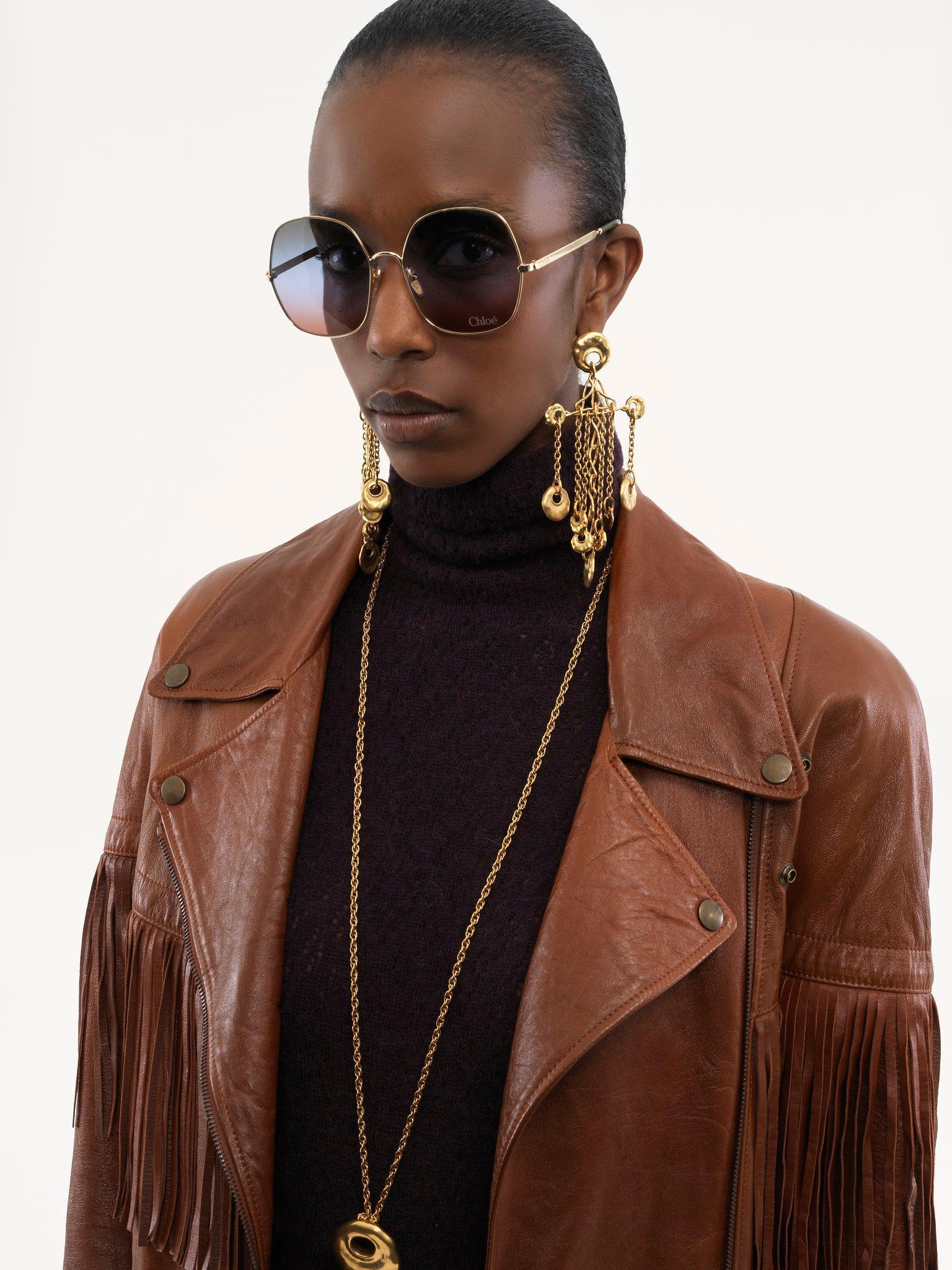 Belted fringed jacket in leather Product Image