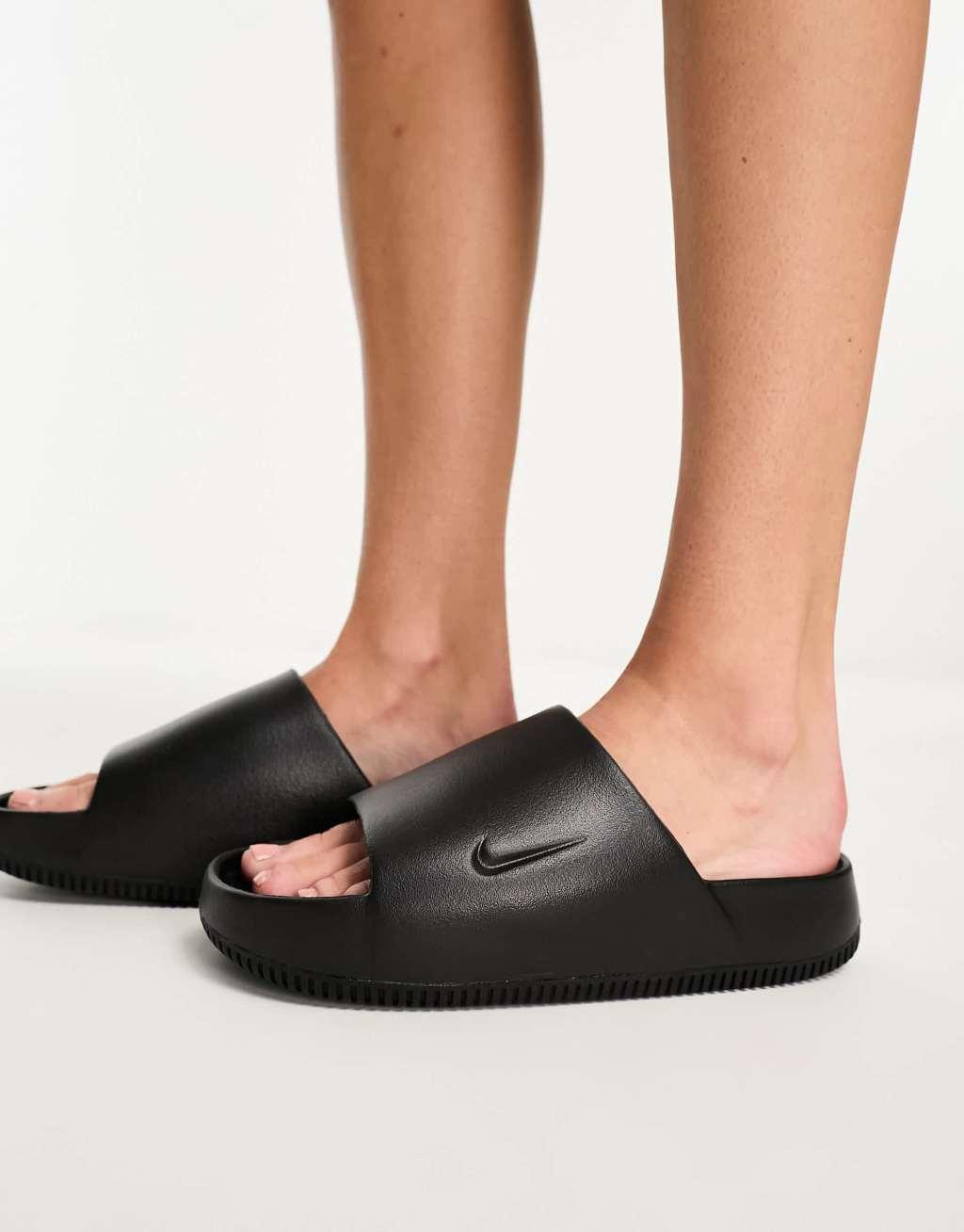 Nike Calm sliders in black Product Image