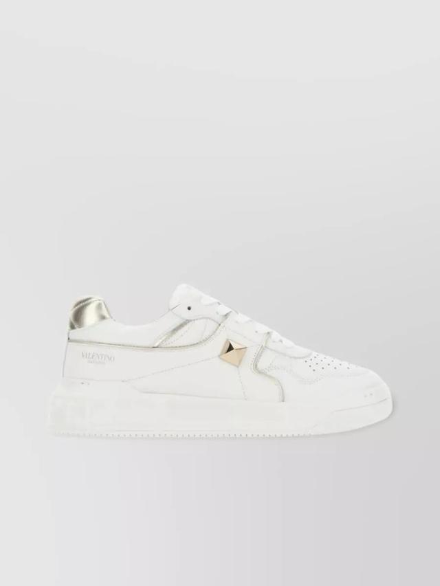 Perforated Leather Studded Sneakers In Cream Product Image