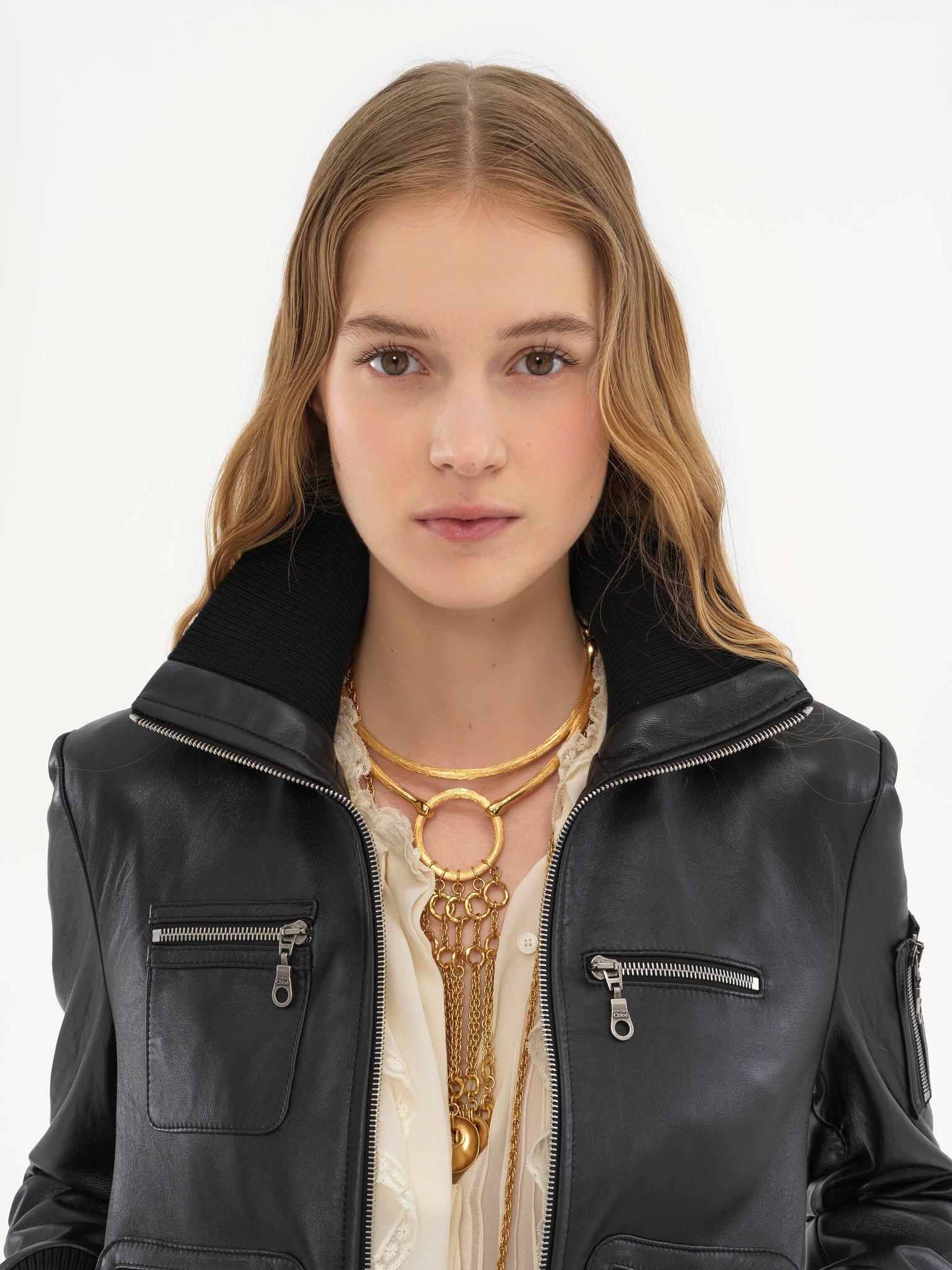 Short blouson in leather Product Image