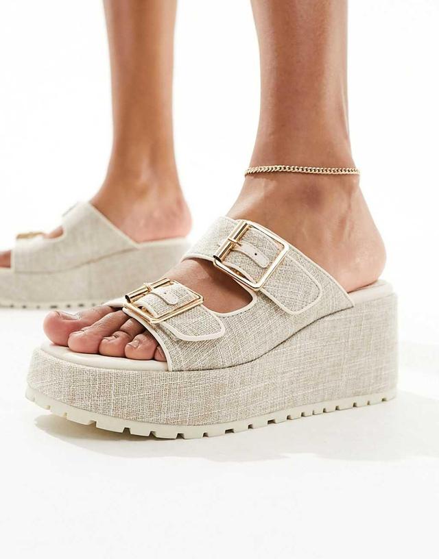 ASOS DESIGN Texas buckle detail wedge mules in natural Product Image