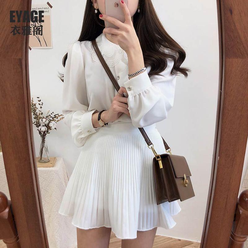 Puff-Sleeve Floral Print Lace-Up Blouse / High Waist Plain Accordion Pleat Mini A-Line Skirt Product Image