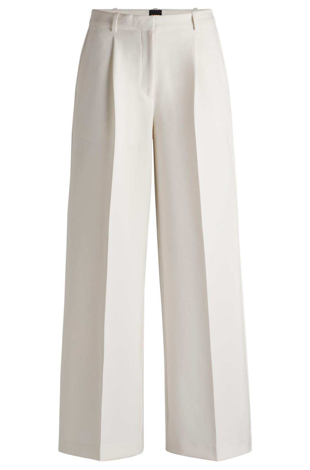 Boot-leg trousers in stretch fabric Product Image