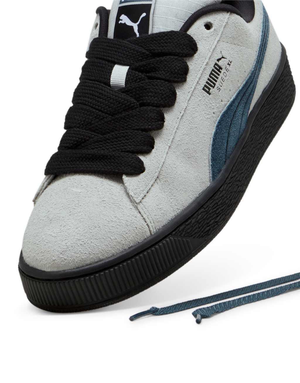 PUMA Suede XL sneakers in gray with black and blue detail Product Image