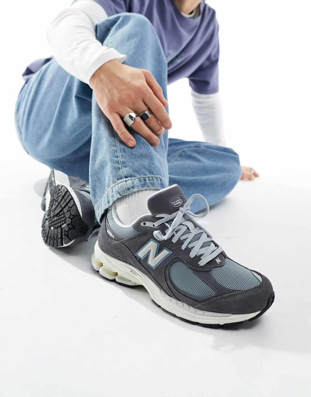 New Balance 2002 sneakers in gray with blue detail Product Image