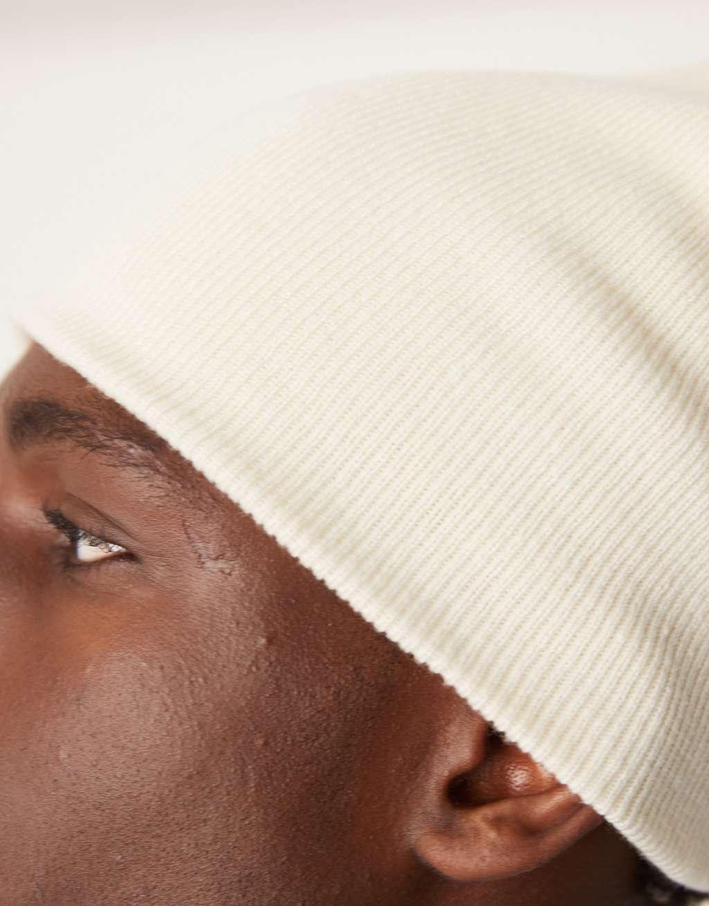 ASOS DESIGN standard skull beanie in cream Product Image