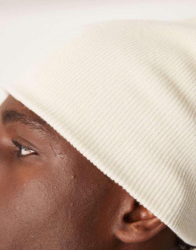 ASOS DESIGN standard skull beanie in cream Product Image