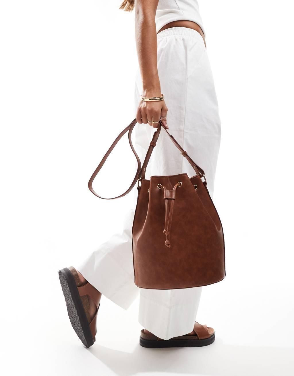 Glamorous crossbody bucket bag in brown  Product Image