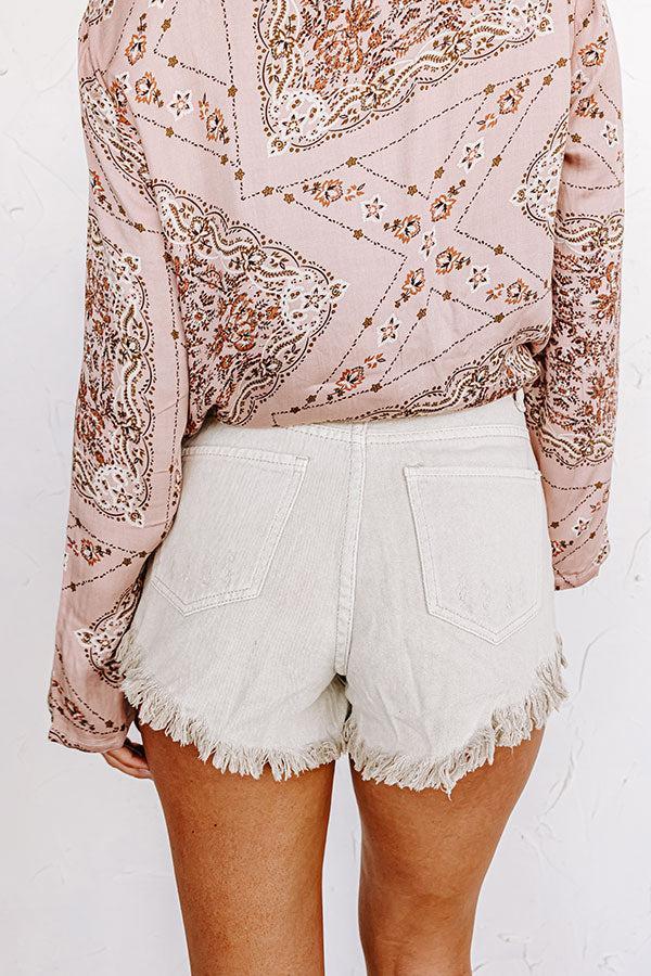 The Misi High Waist Frayed Shorts In Light Beige Product Image