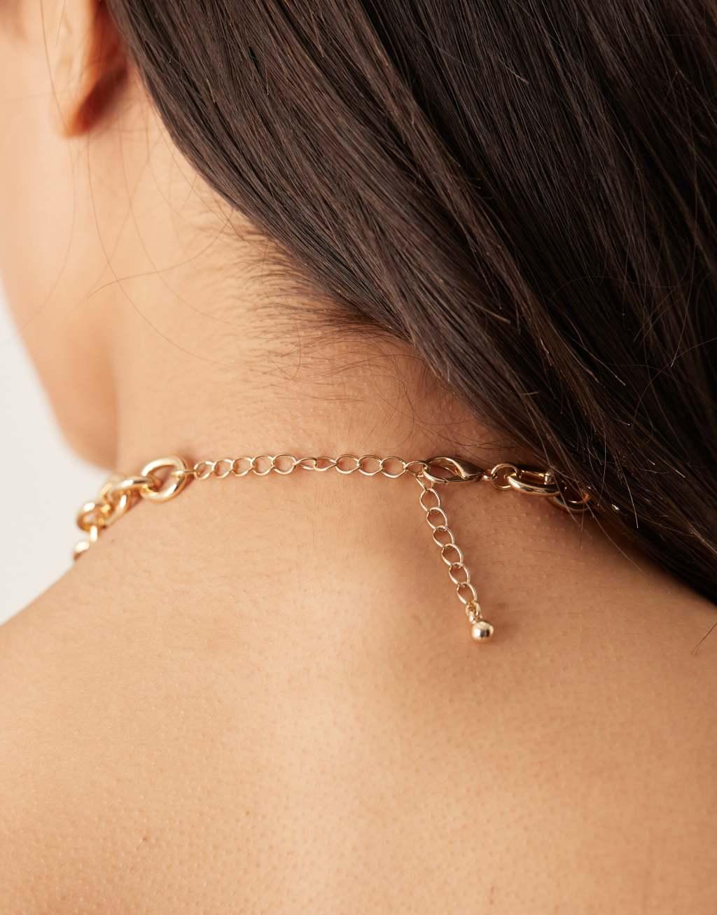 ASOS DESIGN necklace with charm heart detail in gold tone Product Image