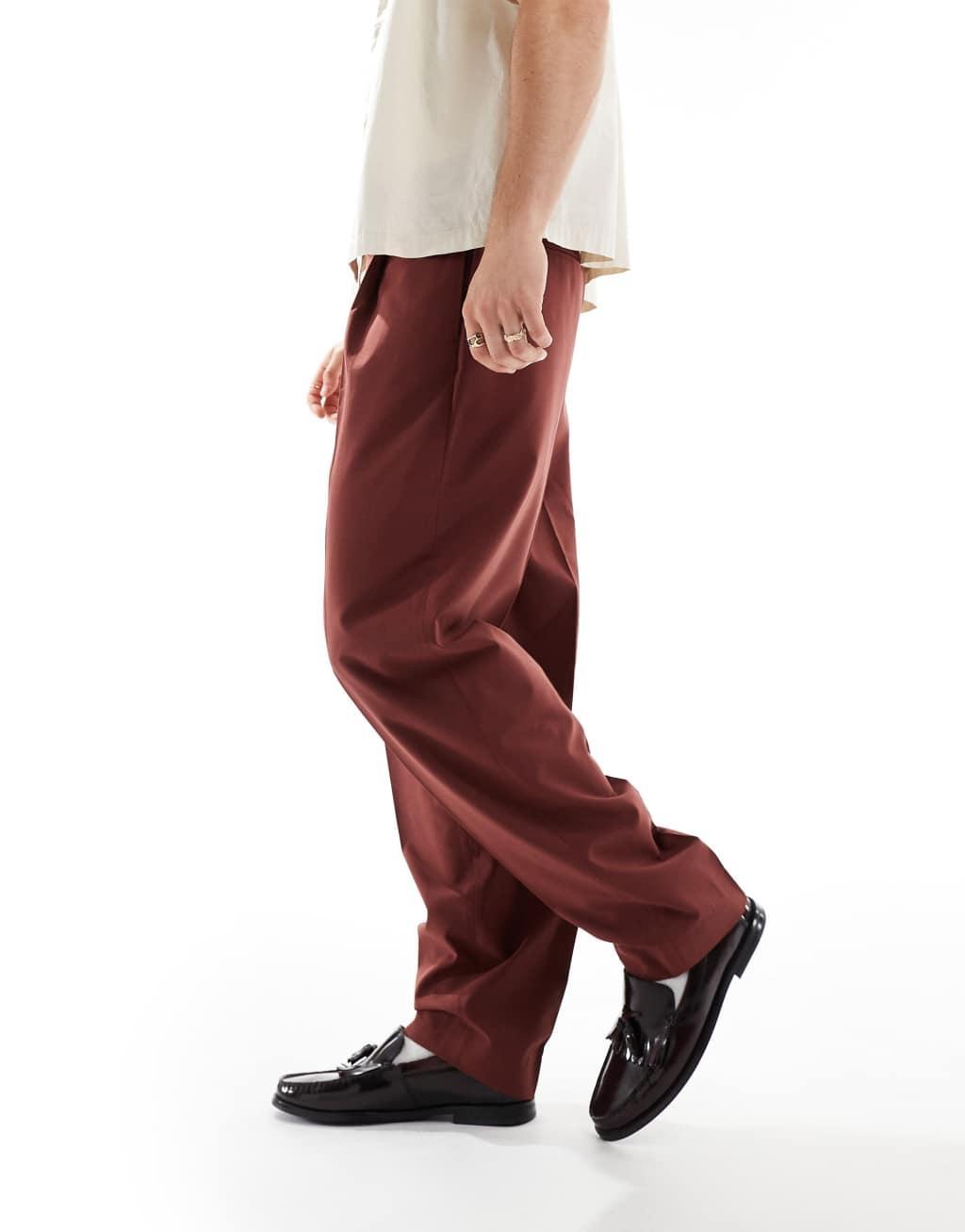 ASOS DESIGN pull on smart oversized tapered pants in burgundy Product Image