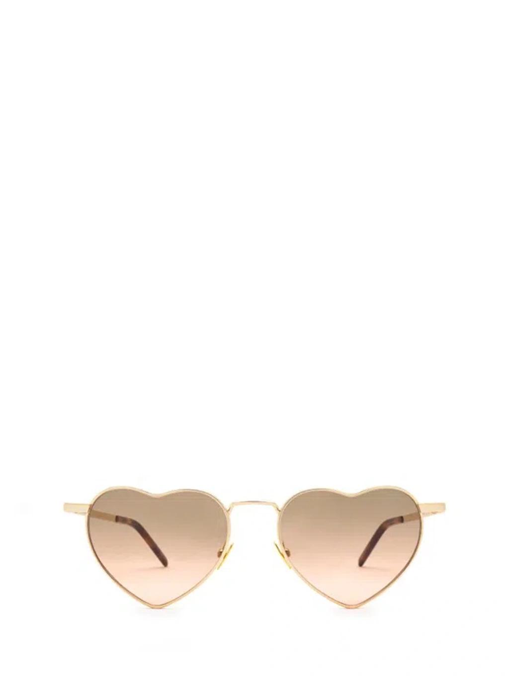 Eyewear Loulou Heart Frame Sunglasses In Gold Product Image