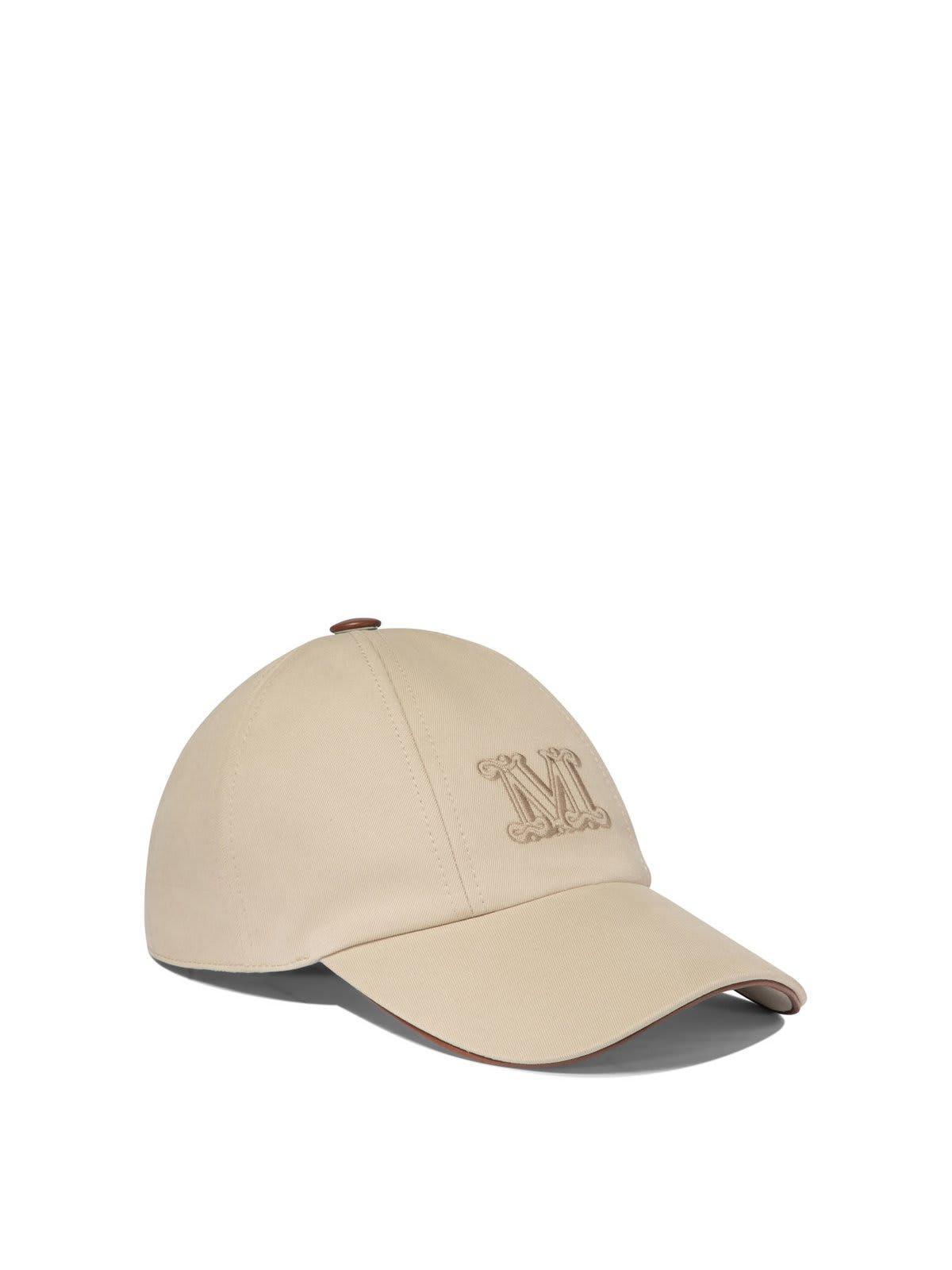 Logo Embroidered Baseball Cap In Beige Product Image