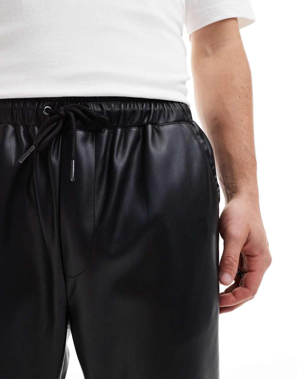 ASOS DESIGN leather look tapered pants in black Product Image