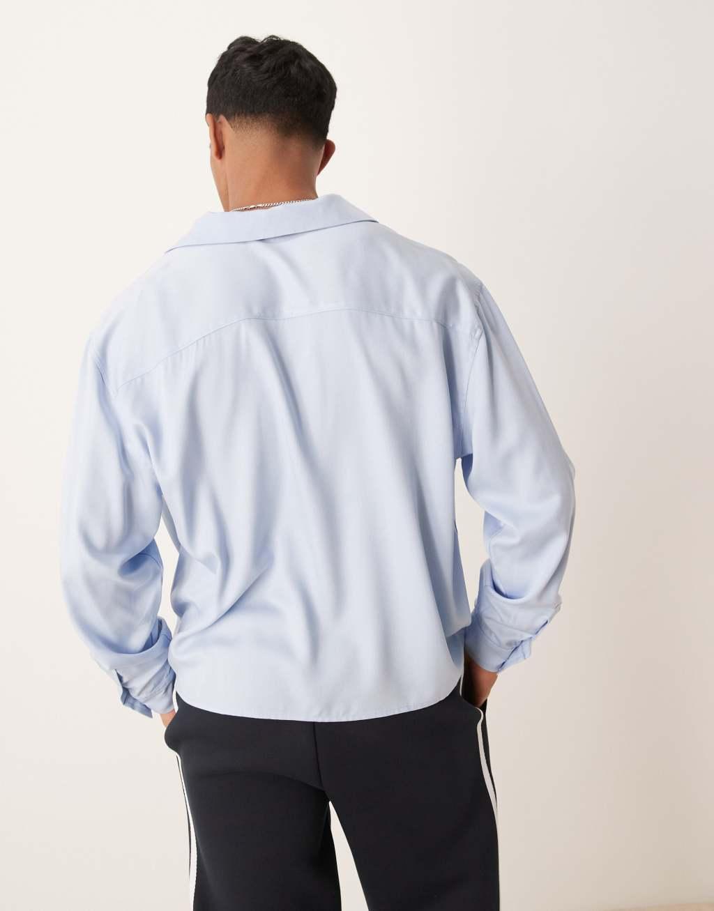 ASOS DESIGN oversized boxy shirt with camp collar in light blue Product Image