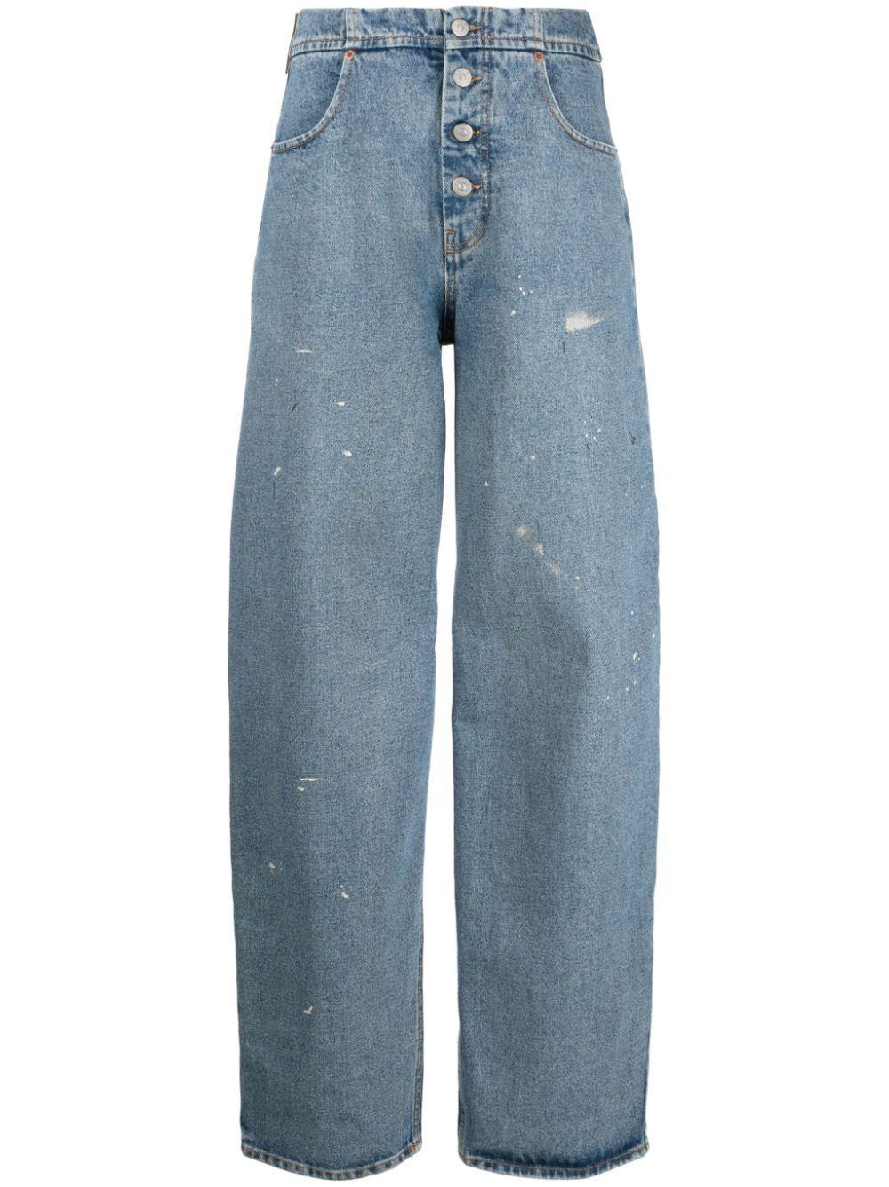 Distressed high-rise tapered jeans product image