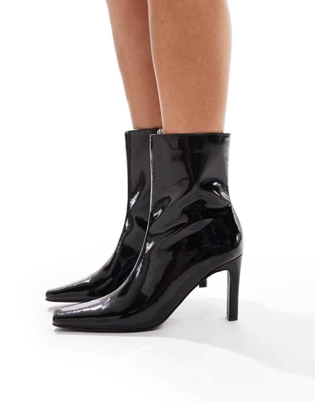 Public Desire Polaris square toe heeled ankle boots in black Product Image