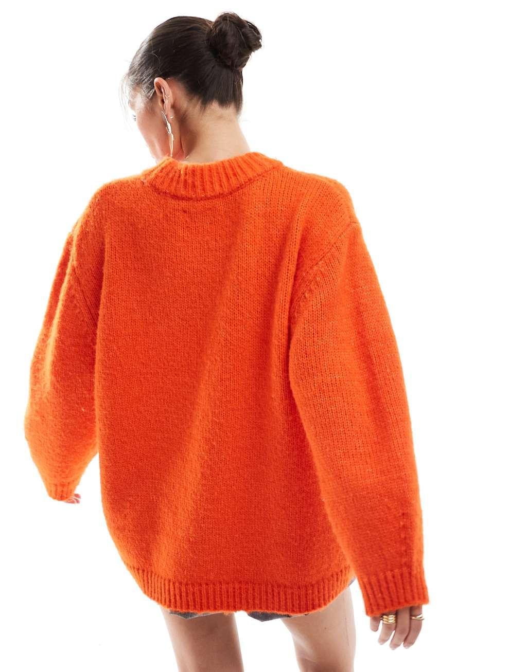 ASOS DESIGN oversized crew neck sweater in orange Product Image