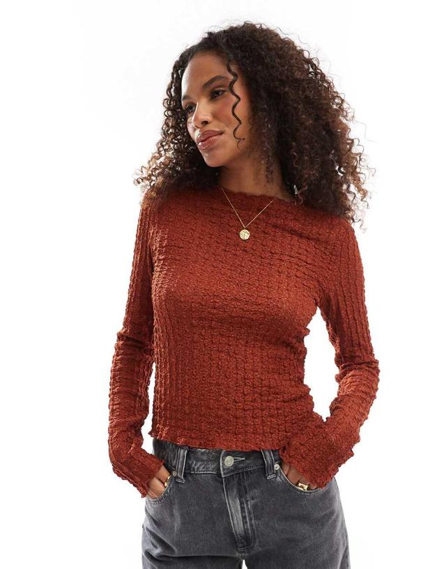 Vero Moda Aware textured long sleeved top in rust brown Product Image