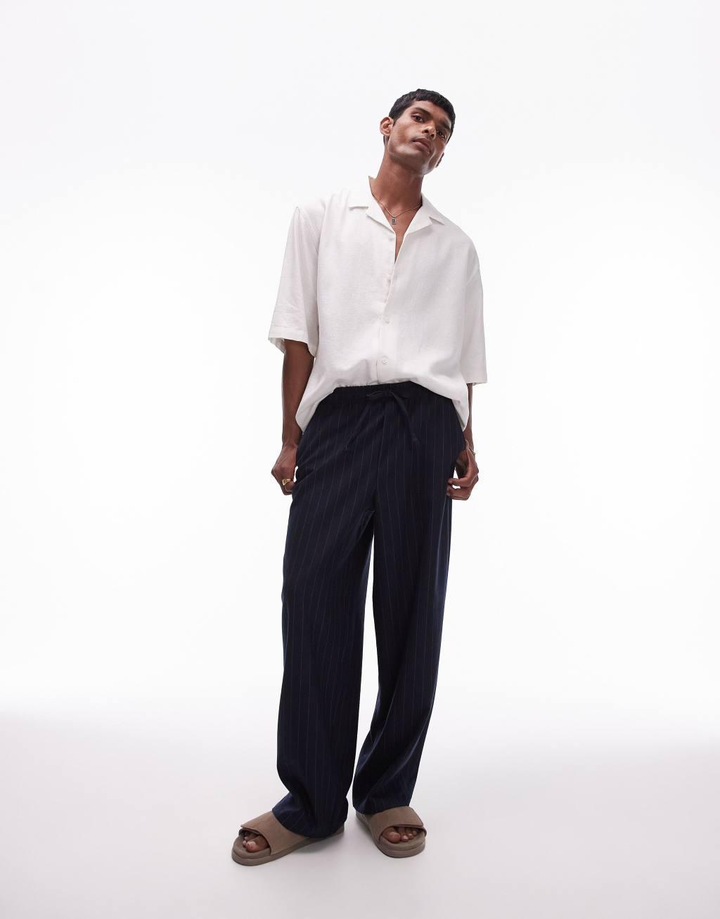 Topman wide leg pin stripe pants in navy Product Image