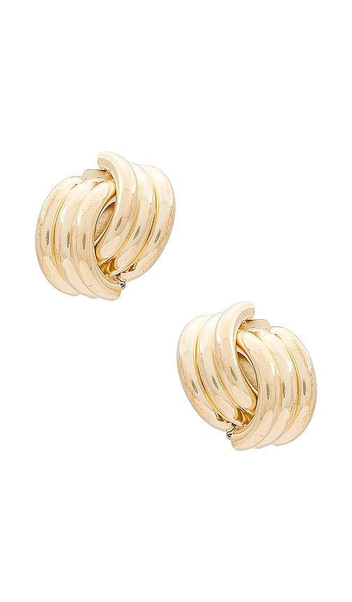 SHASHI X Revolve Knot Earrings in Metallic Gold. Product Image