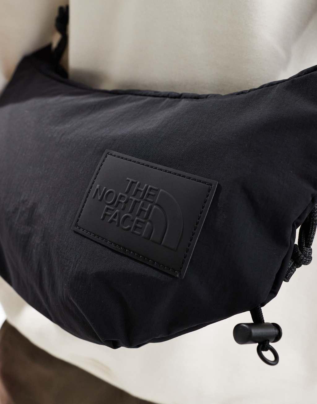 The North Face Never Stop sling cross body bag in black Product Image