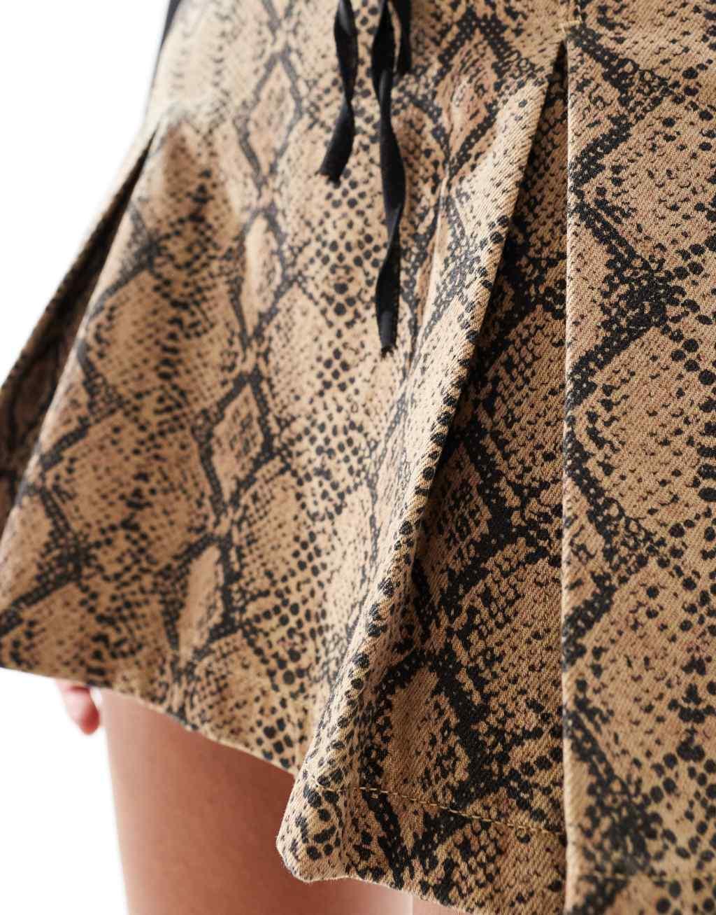 ASOS DESIGN denim pleated skirt in snake print Product Image