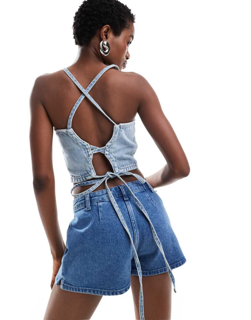 Calvin Klein Jeans tie detail crop top in light wash Product Image