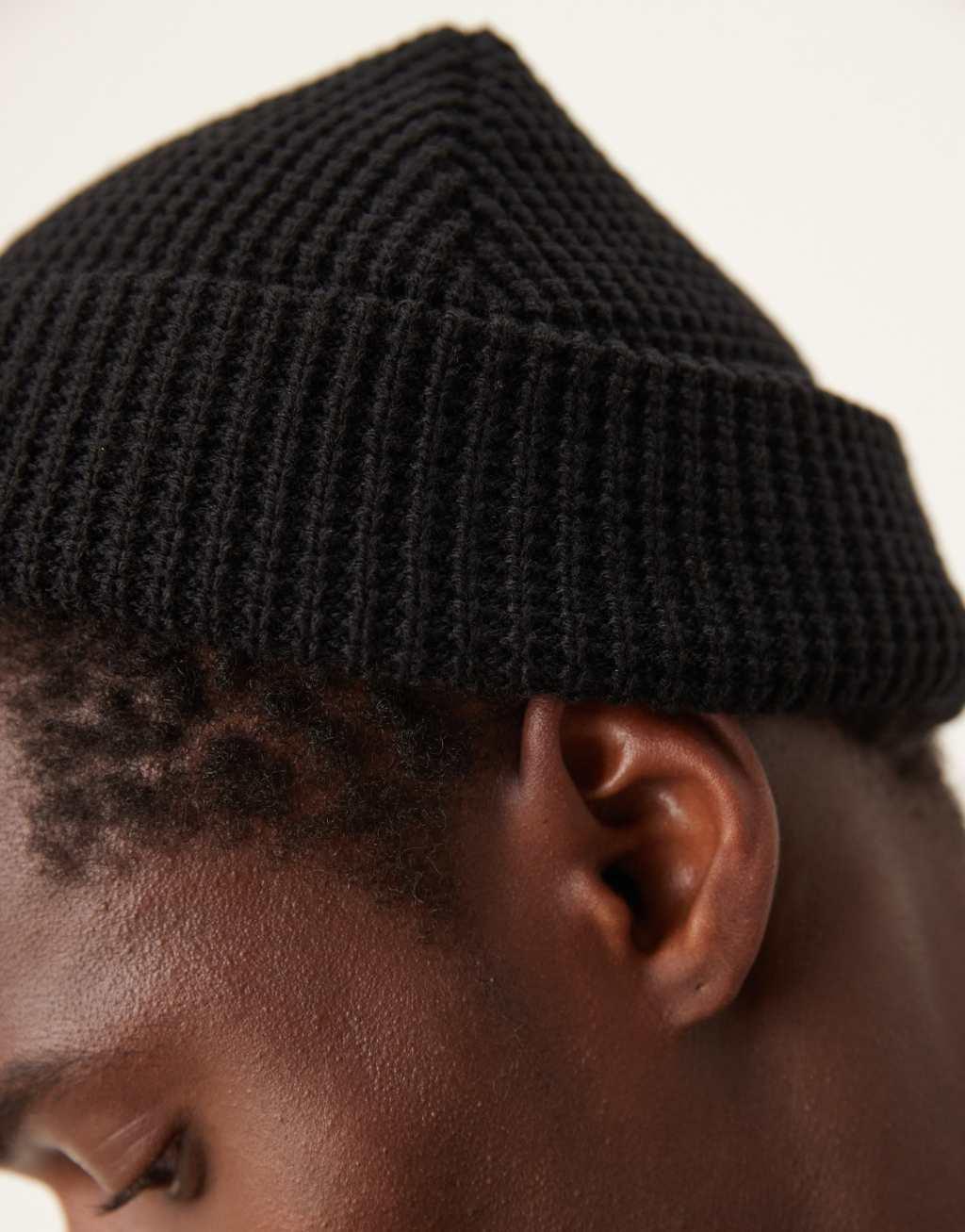 ASOS DESIGN waffle knit beanie in black Product Image