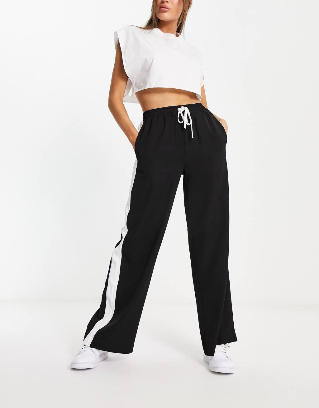 ASOS DESIGN pull on pants with contrast panel in black Product Image