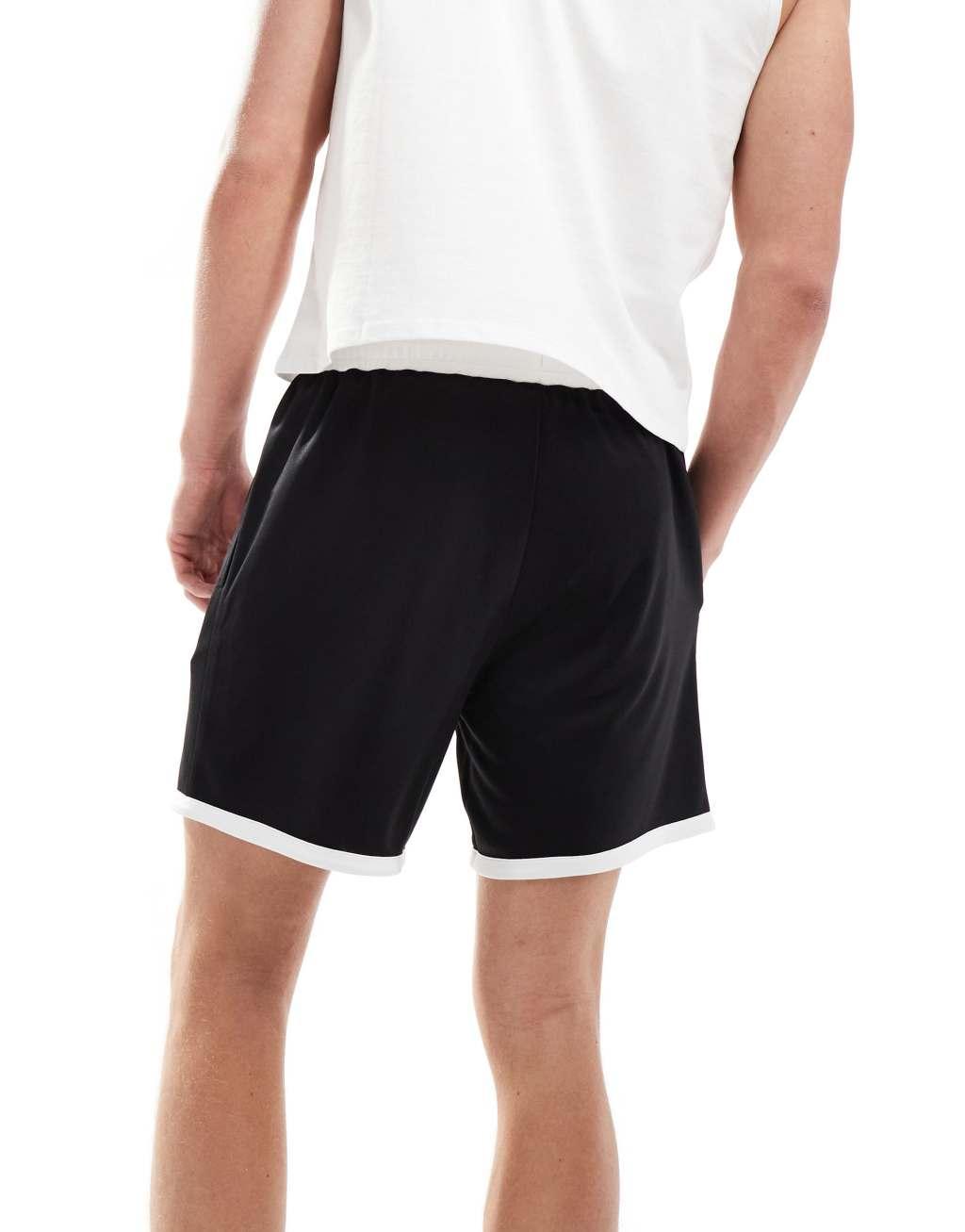 ASOS 4505 training mesh shorts with contrast hem in black and white Product Image