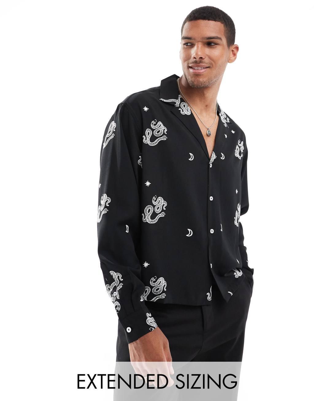 ASOS DESIGN boxy oversized deep revere shirt with snake print in black Product Image