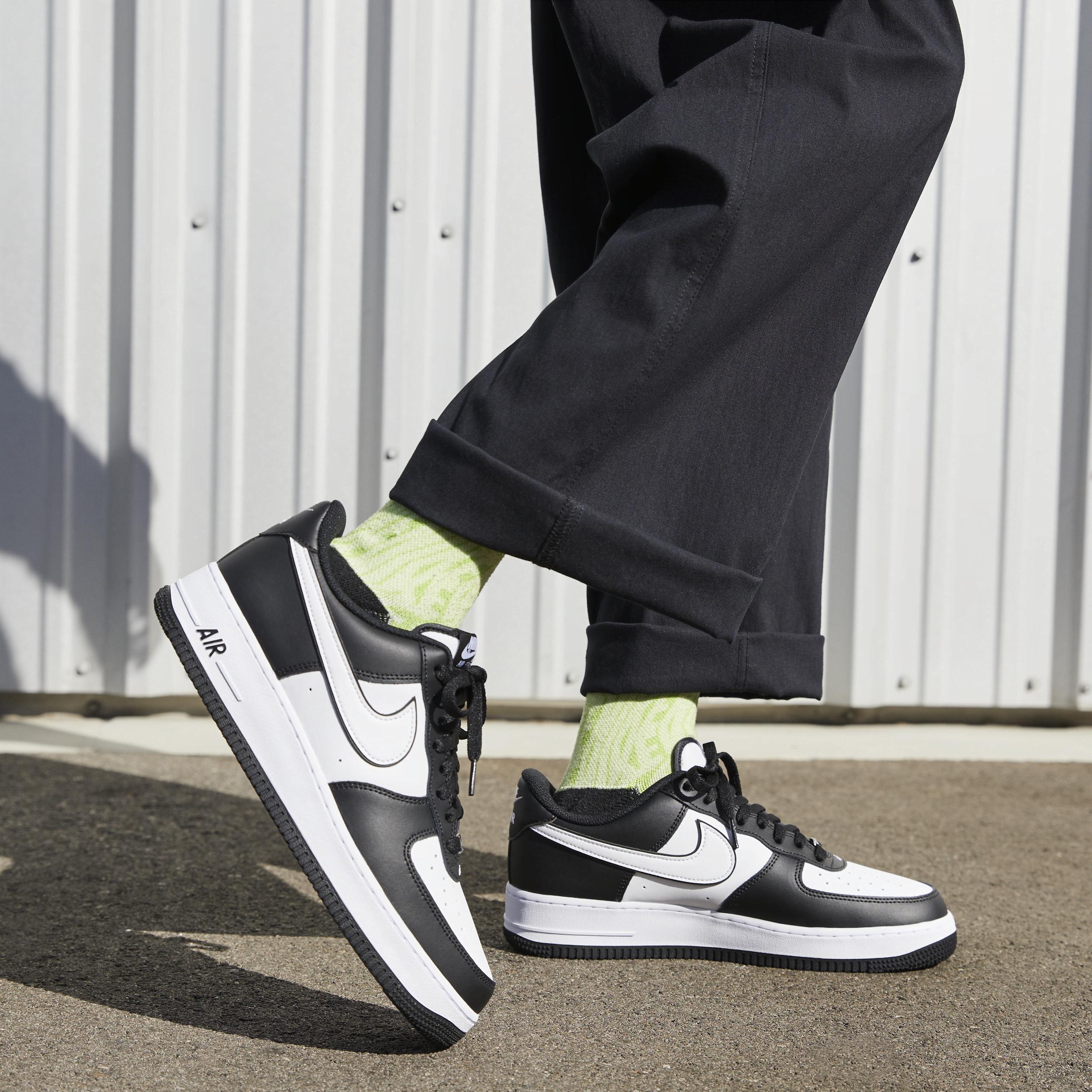 Nike Air Force 1 07 sneakers in white and black Product Image