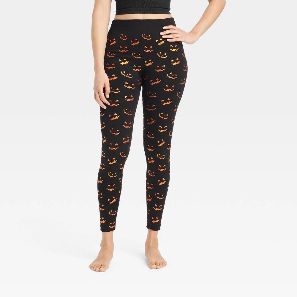 Womens Foil Printed Jack-O-Lantern Faces Halloween Seamless Fleece Lined Leggings - Hyde & EEK! Boutique Black/Orange Product Image