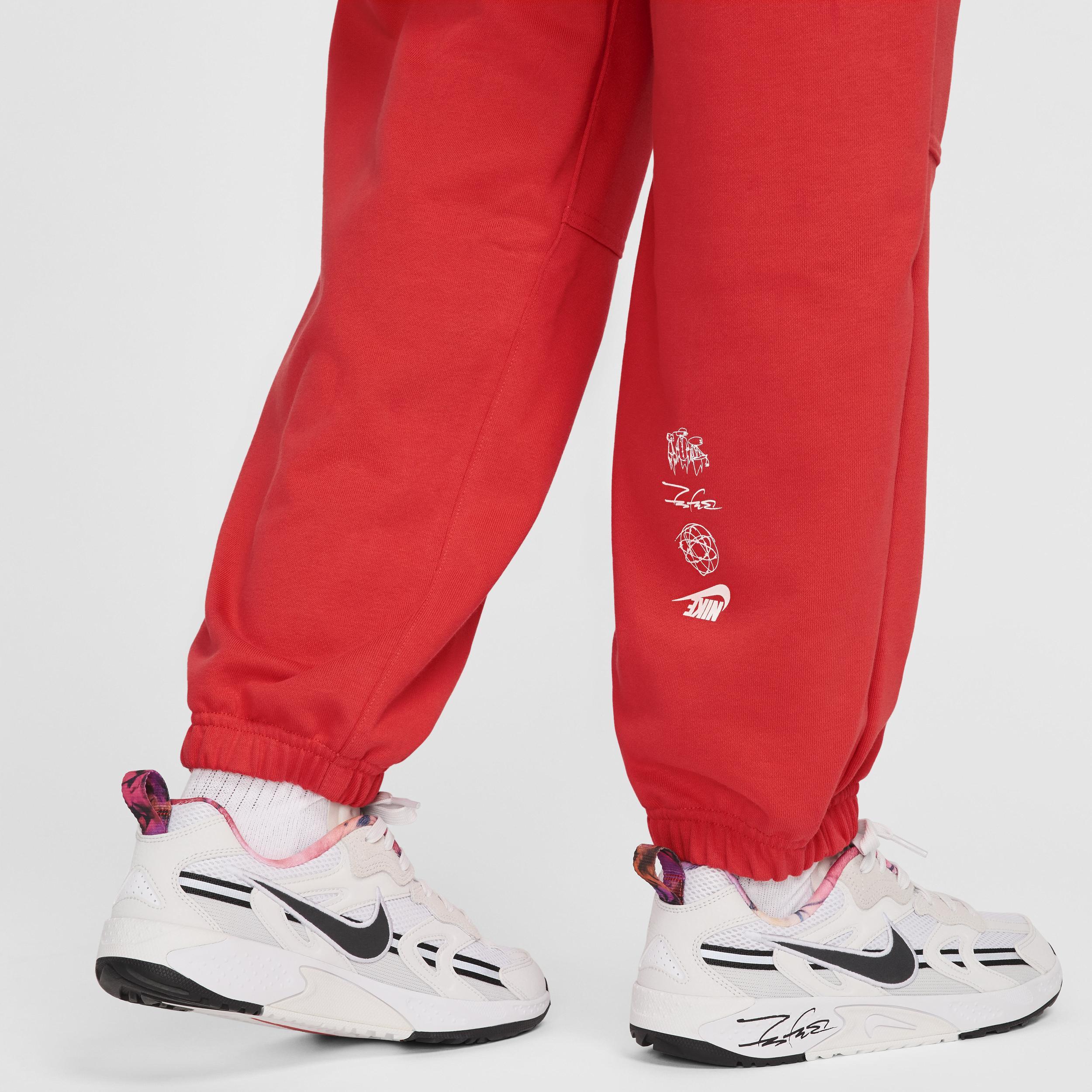 Nike Sportswear Breaking Women's Mid-Rise Oversized French Terry Pants Product Image