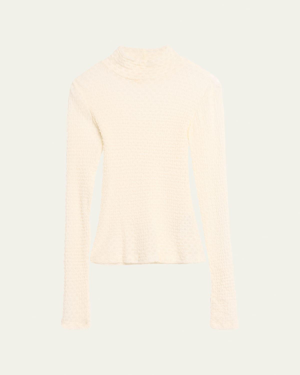 FRAME Mesh Turtleneck in White. Product Image