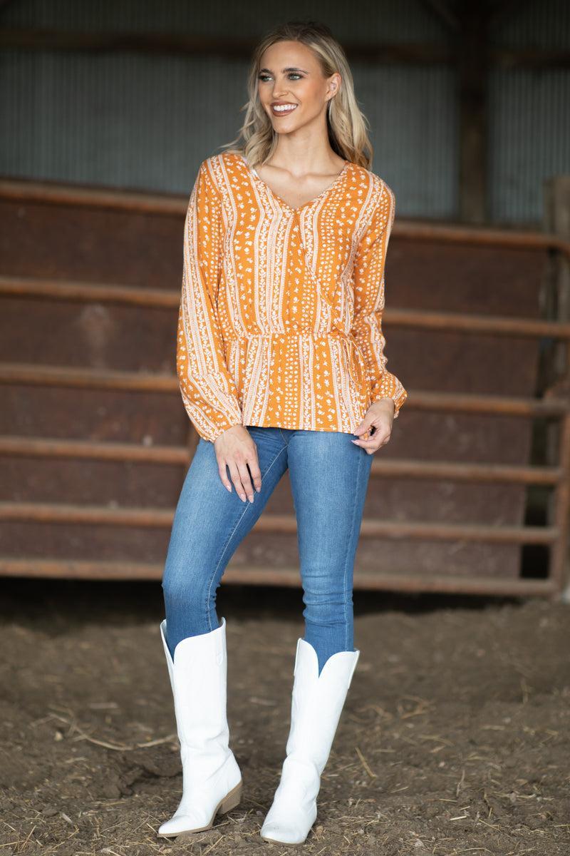 Orange Floral Print Peplum Top Product Image