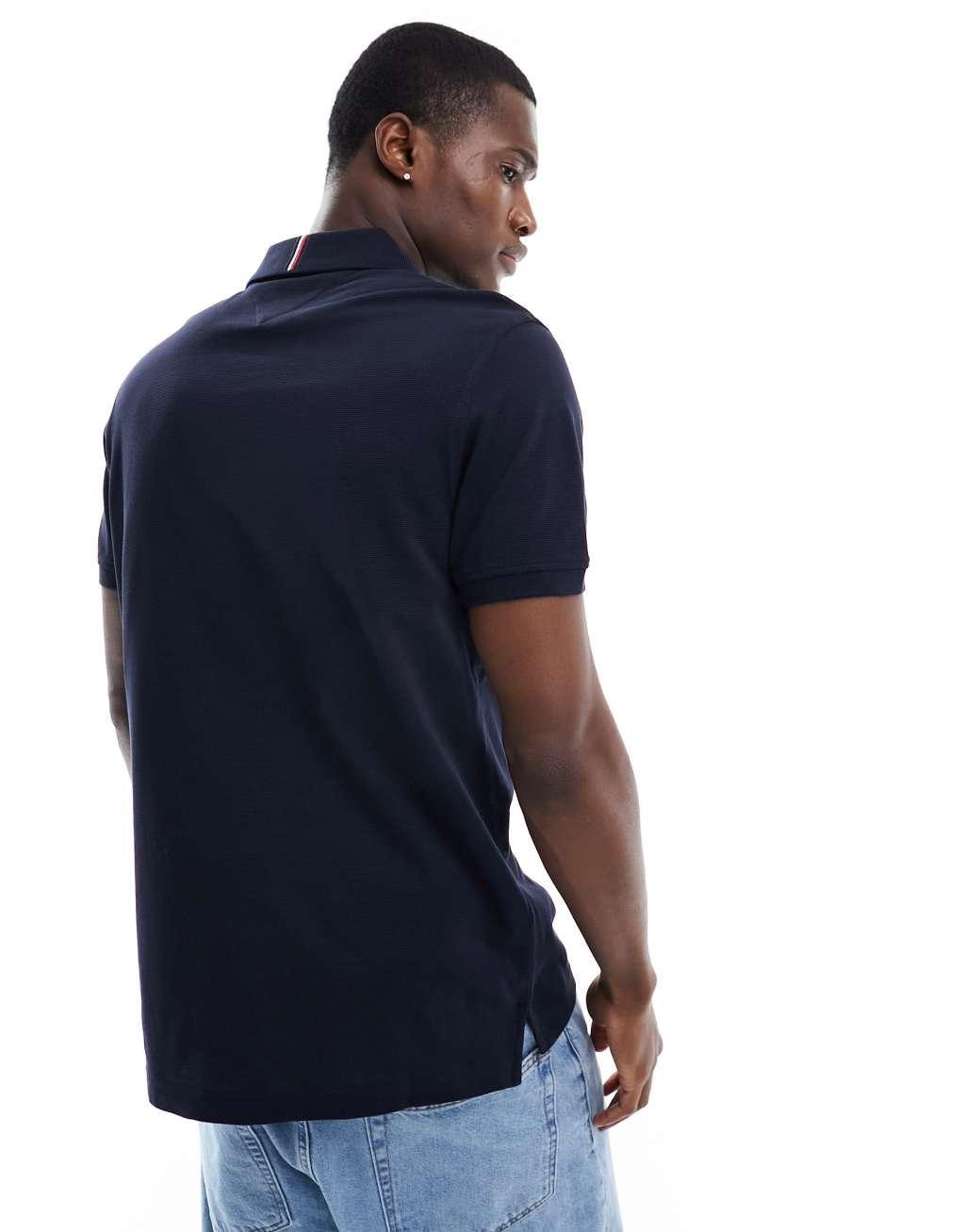 Tommy Hilfiger striped chest regular polo in navy Product Image