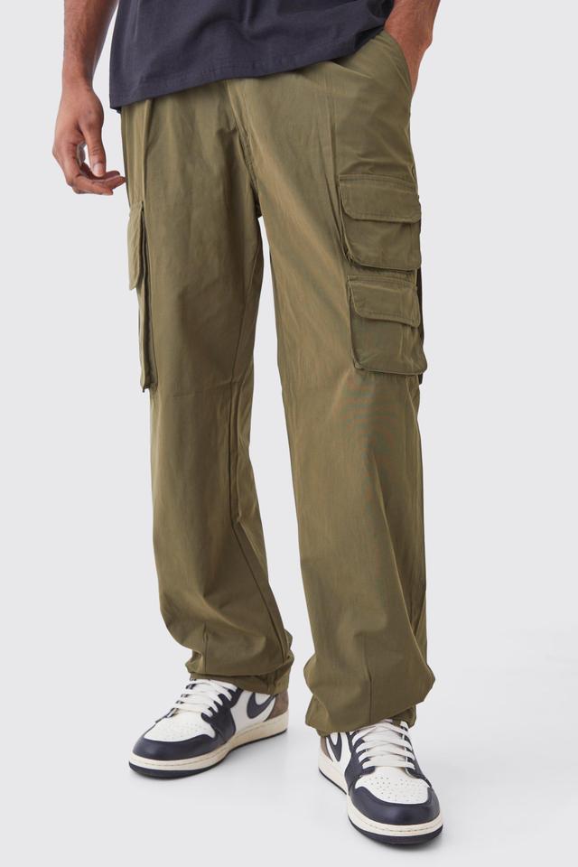 Tall Fixed Waist Relaxed Peached Pleat Cargo Trouser | boohooMAN USA Product Image