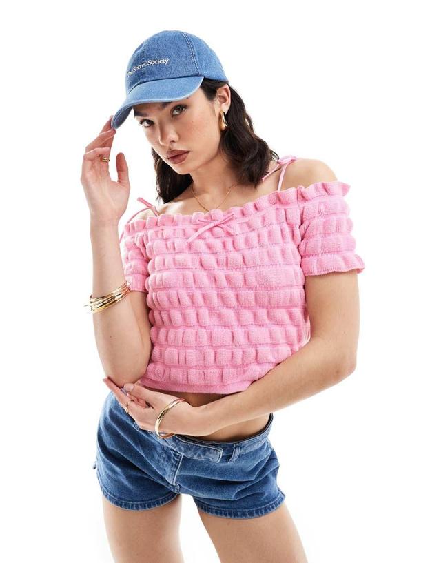 ASOS DESIGN knitted shirred bardot top with tie strap and bow detail in pink Product Image