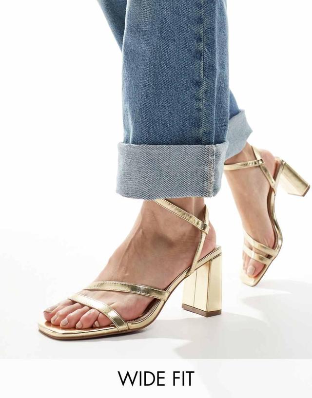 ASOS DESIGN Wide Fit Hampstead mid heeled sandals in gold Product Image