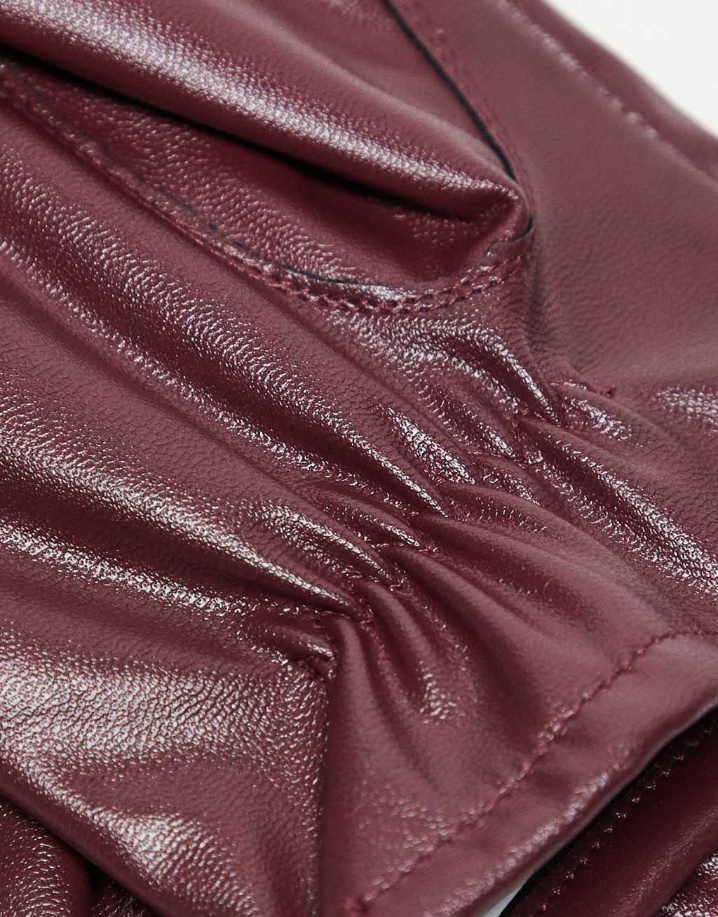 ASOS DESIGN faux leather gloves in burgundy Product Image