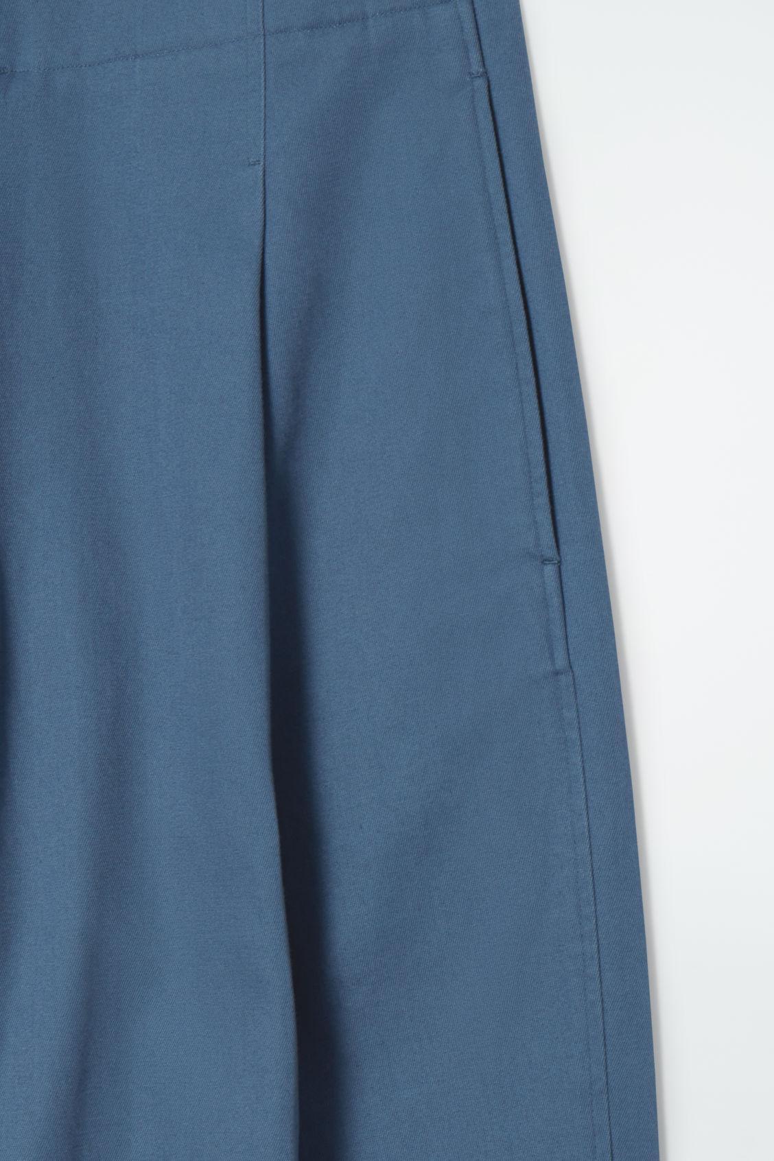 PLEATED BARREL-LEG CHINOS Product Image