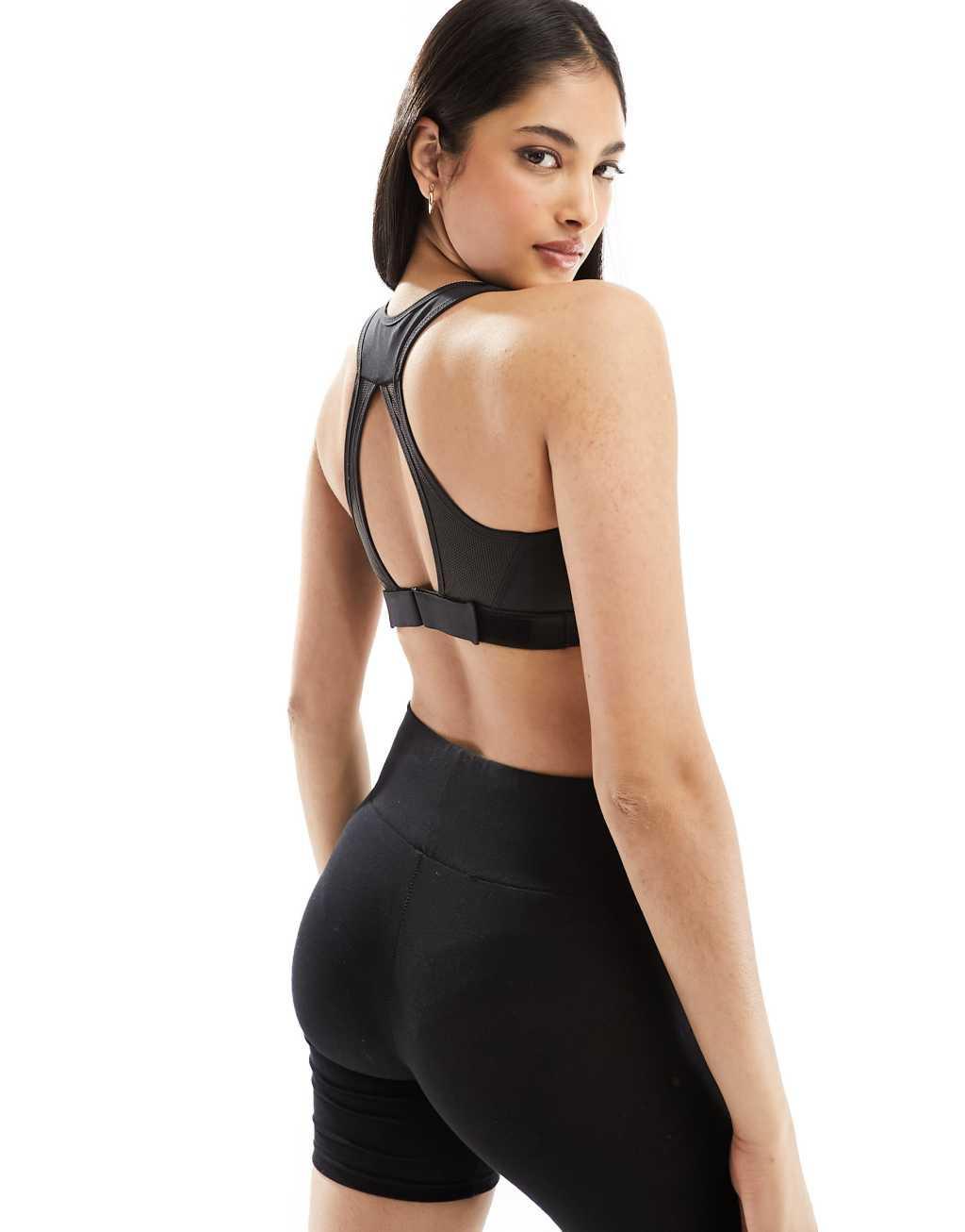 Nike Basketball Dri-FIT Swoosh bra in black Product Image