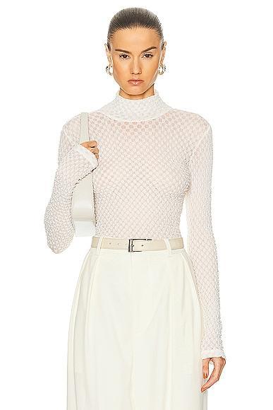 FRAME Mesh Turtleneck in White. Product Image